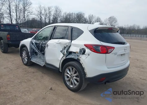 2015 Mazda Cx-5 Grand Touring z USA, uszkodzony, nr VIN JM3KE4DY0F0449616